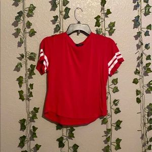 Red shirt with white stripes on sleeves
